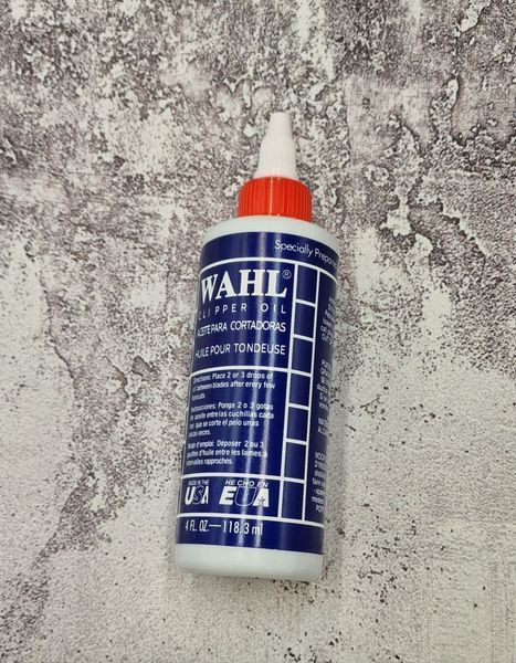 Олія для змащення ножів машинок для стрижки та тримерів Wahl Clipper Oil (118мл) a001 фото