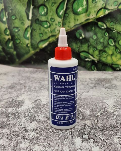 Олія для змащення ножів машинок для стрижки та тримерів Wahl Clipper Oil (118мл) a001 фото